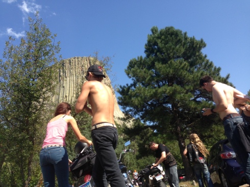 Slathering each other with sunscreen before walking to Devil's Tower